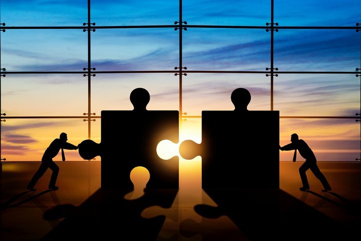 business teamwork puzzle pieces